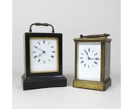 An early 20th century brass cased carriage clock, 17cm high overall, together with an ebonised mantel clock (2)Overall condit