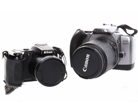 CANON EOS 3000 DIGITAL CAMERAserial number 22001757, fitted with Canon Zoom lens EF 28-90mm 1:4-5.6 with lens cap; also with 