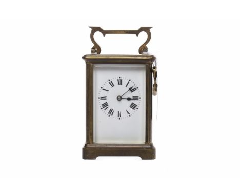 20TH CENTURY FRENCH BRASS CASED CARRIAGE CLOCKthe enamel dial with Roman numerals and blued steel hands, balance wheel moving