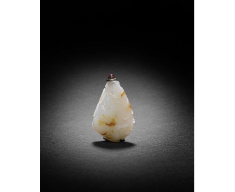 A WHITE AND RUSSET JADE 'GOURD AND BUTTERFLY' SNUFF BOTTLE18th/19th century The bottle shaped as a gourd, finely carved with 