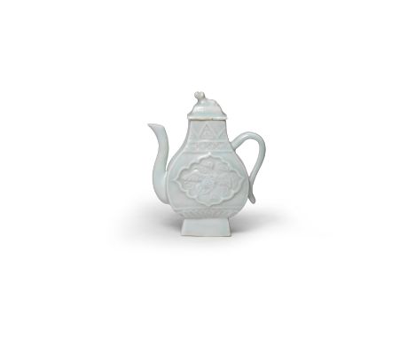 A QINGBAI EWER AND COVERYuan DynastyElegantly potted of flattened pear shape rising from a tapering foot, applied with a loop
