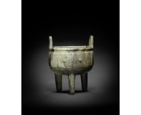 A MOTTLED GREEN AND RUSSET JADE INCENSE BURNER, DINGMing Dynasty The vessel raised on three columnar legs, crisply carved in 
