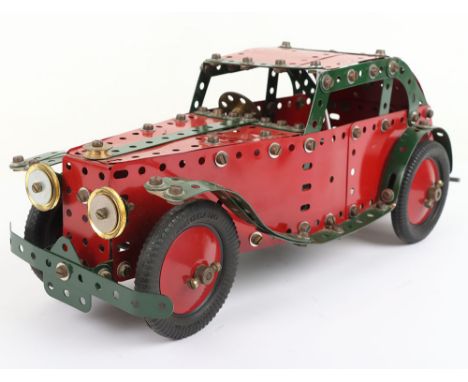 Meccano Coupe Clock Work  Saloon Car, red/green, with working clock work motor, in excellent original condition. Approx Size 