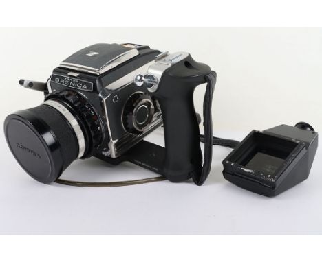 Zenza Bronica Model C2 Single Lens Reflex Camera, with a Super Komura f=50mm 1:35 lens, lens cap, Bronica pistol grip, strap 