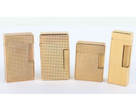 Four gold plated vintage pocket lighters, two spuriously marked Dupont, one Dunhill and another, (4)