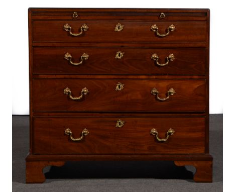 A George III mahogany chest of drawers, fitted with a brushing slide over four graduating long drawers, bracket feet, old ref