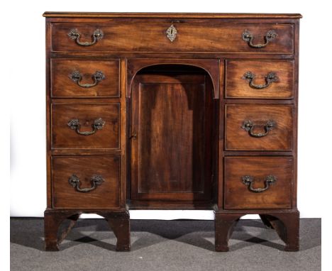 A George III mahogany knee-hole dressing table, rectangular top with a moulded edge, fitted with a single frieze drawer, thre