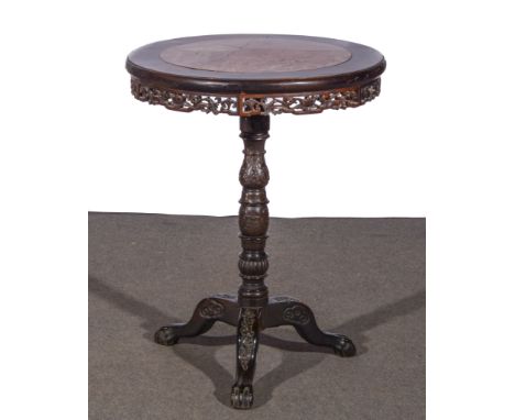 A Chinese hardwood occasional table, circular top with a marble inset, moulded edge, carved and pierced openwork scroll friez