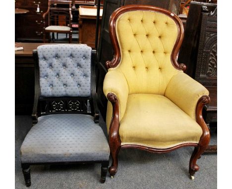 A Victorian Carved Mahogany Spoon Back Armchair, with deep buttoned upholstery and on scroll supports with pot castors, toget