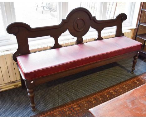 A Victorian Oak Hall Bench, with moulded shaped back, on turned supports, bearing label "WM JOHNSON &amp; SON, 82 &amp; 84 FA