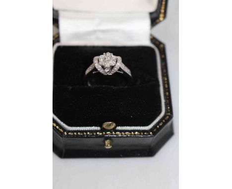 Diamond cluster 9 carat white gold ring, size K/L.