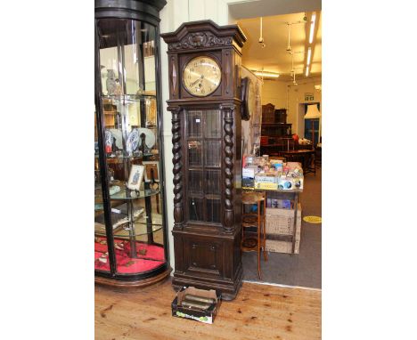 Early 20th Century carved oak triple weight longcase clock.