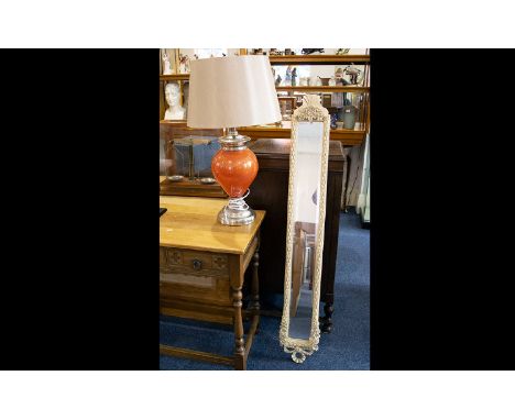 Modern Decorative Table Lamp orange bulbous stem on chrome circular base with sheer ivory coloured shade. Together with an or