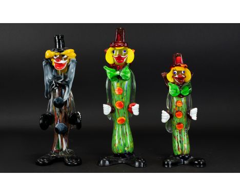 Murano Glass Clown Figures Three in total to include standing clown with black glass cymbals, standing clown with green confe