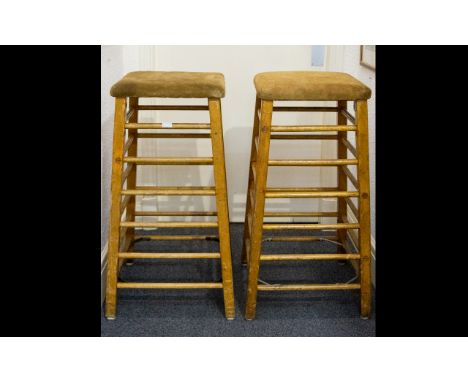 A Pair Of Suede Golden Oak And Beech 1950's Tall Gymnasium Stools Two square topped vaults of typical form with ladder sides.