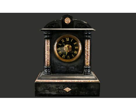 A Belgian Black Slate Architectural Clock Finished with Rosso marble pillars and inserts, black dial with Roman numerals, mar
