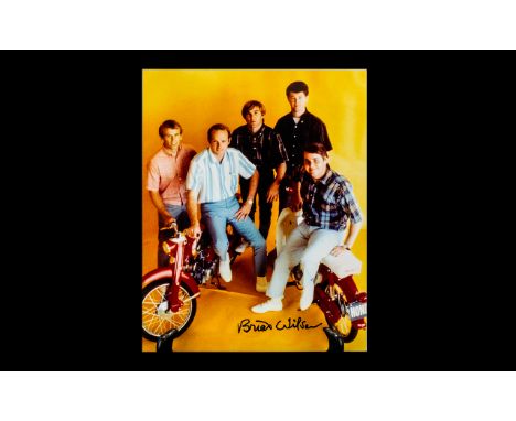 Music Interest Beach Boys Brian Wilson Autograph On Colour Photograph Colour group portrait signed in black marker 'Brian Wil