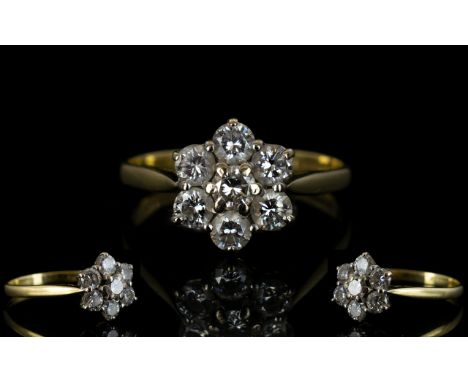 18ct Gold Diamond Cluster Ring Flowerhead setting, set with 7 round modern brilliant cut diamonds, est diamond weight 1.00ct.