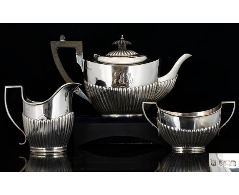 Victorian Period Matched Bachelors 3 Piece Silver Tea Service of Good Proportions. All with Ribbed Half Body and Stylish Hand