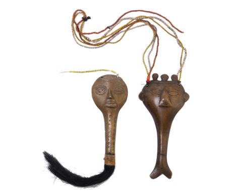 North East India, Naga, two brass pectoral ornaments, one with attached animal hair, both with small beads.  L. 14,5 and 16 c