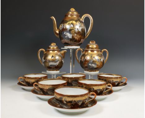 Japan, Satsuma porcelain tea-service, early 20th century, each painted with Immortals surrounding a dragon, comprising a tea-