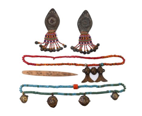 North East India, a pair of metal ear ornaments, decorated with metal bells and beaded strings. Herewith two necklaces with b