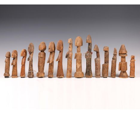 Burkana Faso, Mossi, a collection of fifteen various dolls. Collected in situ late 1960's. L. 13 - 25,5 cm. [15]