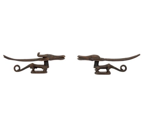 Mali, Bamana, a pair of crest masks, chiwara. with horizontal horns and coiled tails, the male chiwara with curved horns. L. 