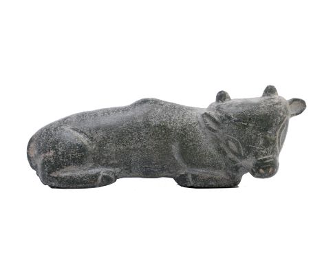 A Near Eastern green stone sculpture of a reclining bull, possibly antique. l. 10,5 cm. Bought at the London art market, 1980