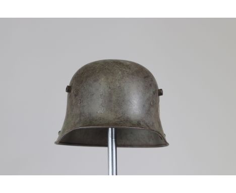 Germany ww1 helmet Mitralleur badgeSizes: L. totale= 320mm H = 170mmWeight (K): 1,32kgCondition: At first glance: patina, nor