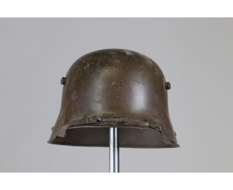 German WWII model 16 helmetSizes: L. totale= 310mm H = 170mmWeight (K): 1,25kgCondition: At first glance: patina, normal wear