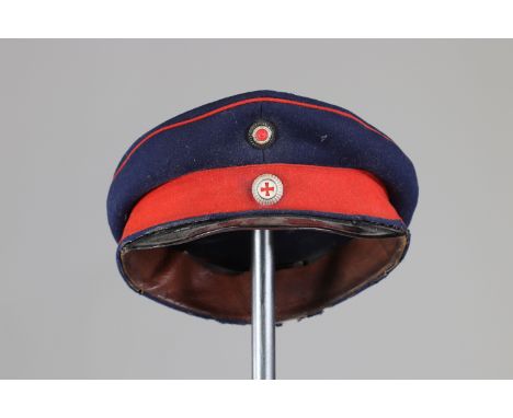 German WWI cap (health service)Sizes: L. totale= 220mm H = 100mmWeight (K): 0,16kgCondition: At first glance: patina, normal 