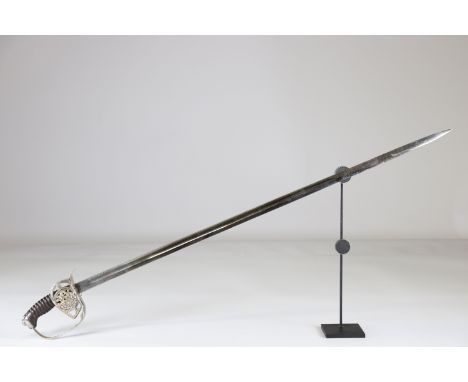 German officer saber 1914-1918, no engraving, with blazon on the hiltSizes: L. totale= 960mm L Lame= 830mm l lame= 22mmWeight