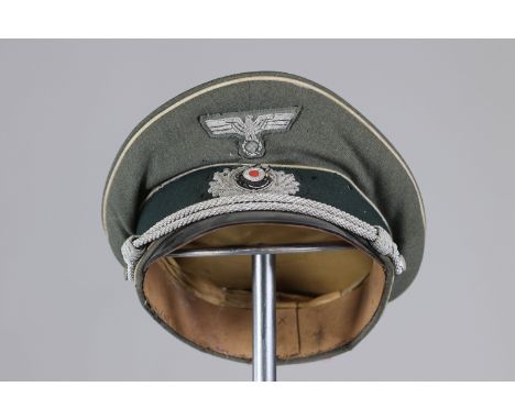 German WWII capSizes: L. totale= 235mm H = 140mmWeight (K): 0,2kgCondition: At first glance: patina, normal wear
