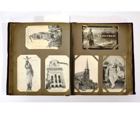 Vintage Postcards in an old album with burgundy velvet binding - containing about 200 cards or early fabric greetings cards. 