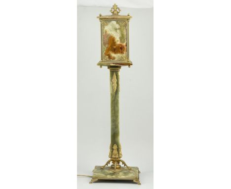 Onyx and brass table lamp, lantern top, square column and plinth with paw feet, height 78cm.