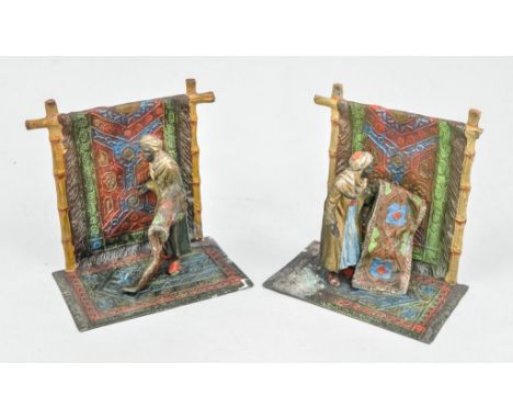 Pair of Bergmann style painted spelter book ends, designed as carpet sellers, height 13cm, (one a.f.).