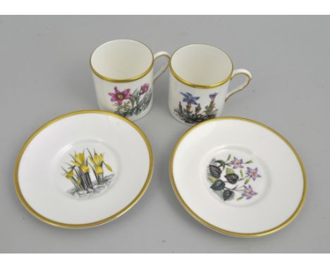 Set of six Royal Worcester coffee cans and saucers, printed floral patterns, (cased), the case 35cm.