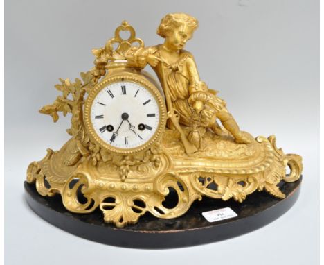 19th Century French ormolu mantel clock, figure surround, circular enamelled dial, cylinder movement striking on a bell, sign