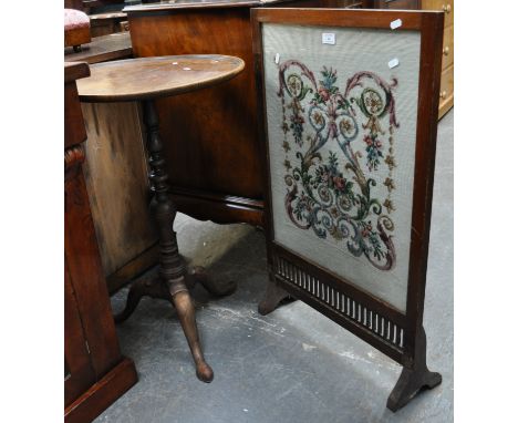 Walnut framed fire screen, inset woolwork panel, width 56cm, height 87.5cm, and a Victorian mahogany tripod table, (2)