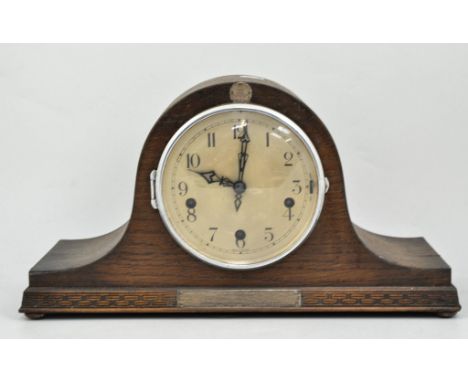 Oak mantel clock and a pair of Marley Horses and a cast iron door stop, (4).