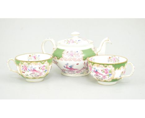 A Minton part teaset, green cockatrice pattern, (a.f.), including one teapot, nine cups (six cracked), six saucers, nine plat