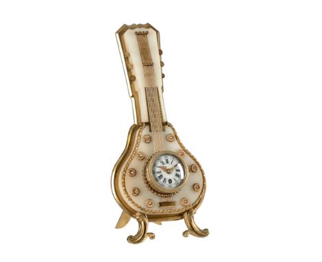 A FRENCH GILT BRASS AND ONYX NOVELTY STRUT TIMEPIECE IN THE FORM OF A MANDOLINUNSIGNED, CIRCA 1900The circular eight-day sing