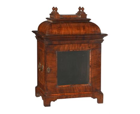 AN UNUSUAL GEORGE I WALNUT OUTER DISPLAY CASE FOR A TABLE CLOCKANONYMOUS, CIRCA 1720The domed caddy superstructure capped wit