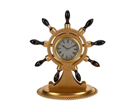 A LATE VICTORIAN GILT BRASS AND AGATE NOVELTY 'SHIP'S WHEEL' TIMEPIECEUNSIGNED, LATE 19th CENTURYThe French circular eight-da
