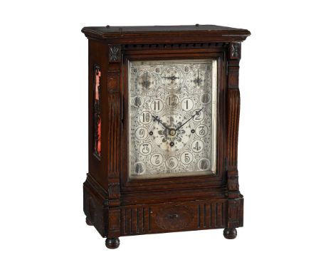 A VICTORIAN AESTHETIC STYLE CARVED OAK QUARTER-CHIMING BRACKET CLOCKJOSEPH PENLINGTON, LIVERPOOL, LATE 19th CENTURYThe substa