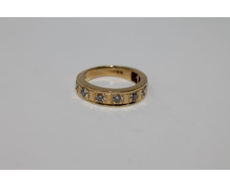 18ct half eternity ring with eight stones 5.2 grams