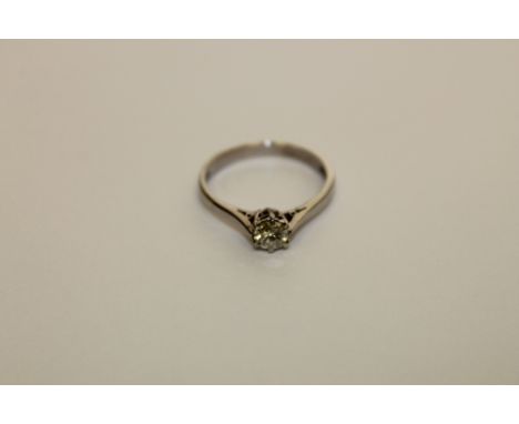 An 18ct white gold solitaire diamond ring