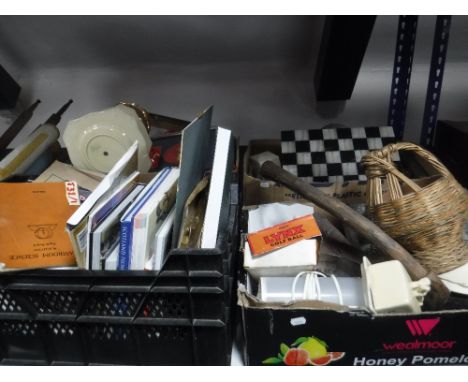 Four boxes of miscellaneous books, marble chess board, vintage links golf balls, china etc 