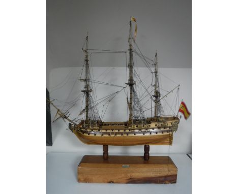 A wooden model of San Jaun Netomuceno three masted sailing ship on stand 